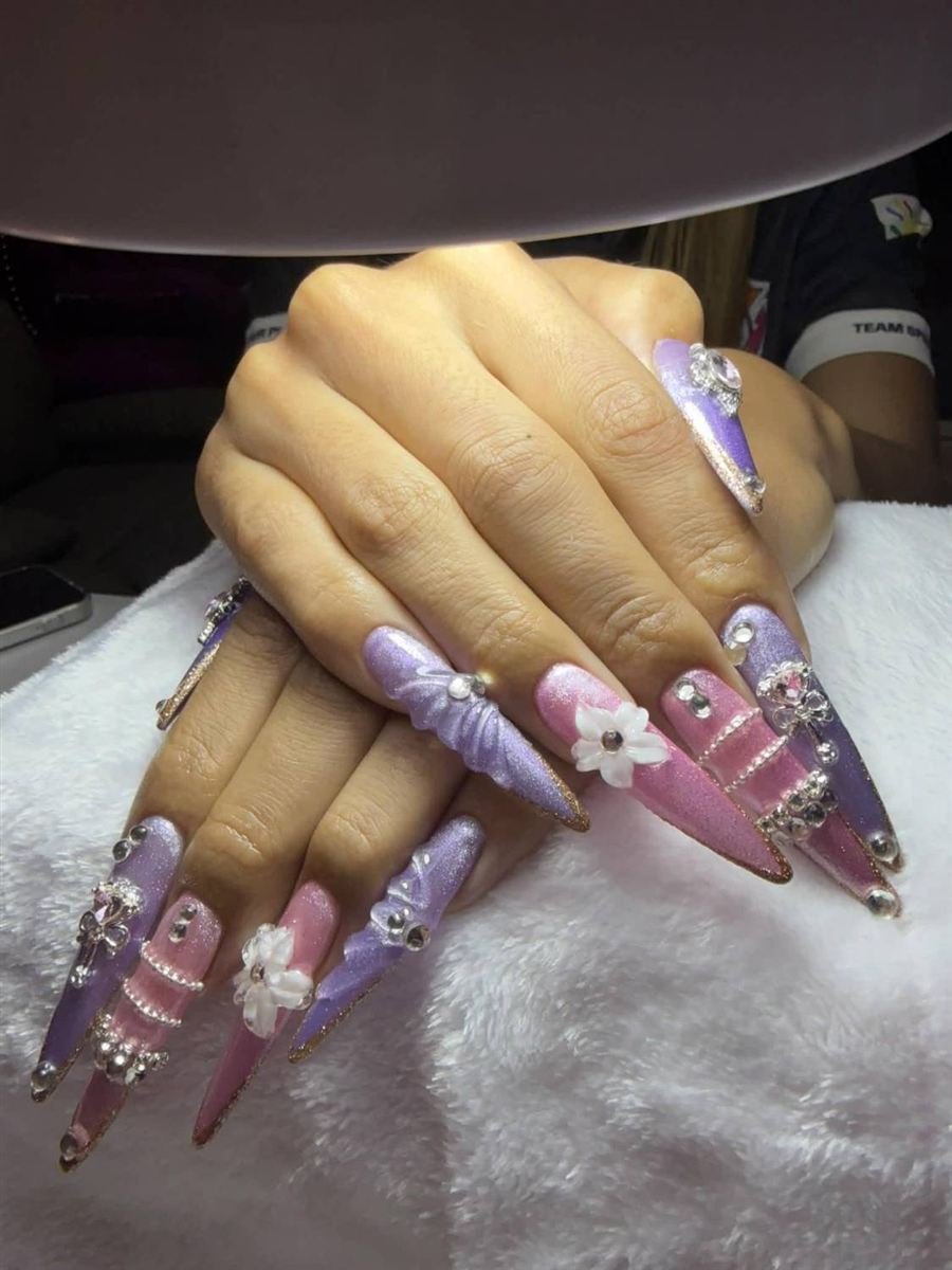 Lilac and pink stiletto nails with 3D flowers